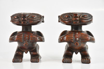 Lot 1516 - A pair of hand carved Tikar, Camaroon figures,...