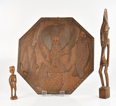 Lot 1521 - Two hand carved African figures, larger 46cm,...