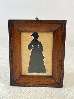 Lot 2308 - An early 19th century cut paper silhouette,...