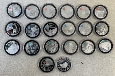 Lot 1162 - ROYAL MINT; a collection of fourteen silver £5...