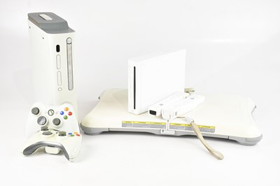 Lot 1597 - An Xbox 360 and a Nintendo Wii with Wii Fit Plus.