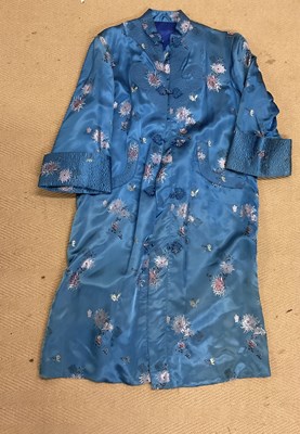 Lot 378 - A Japanese embroidered blue silk kimono.