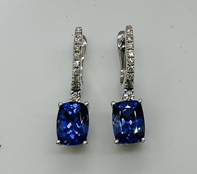 Lot 631 - A pair of 14ct white gold tanzanite and...