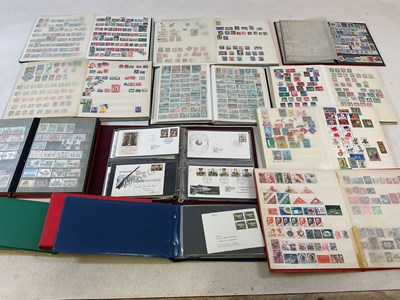 Lot 2102 - A collection of nine world stamp albums and...