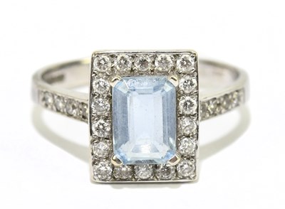 Lot 1020 - A 9ct white gold, diamond and aquamarine ring...