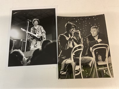 Lot 2054 - Two black and white photographs; Stevie Wonder...