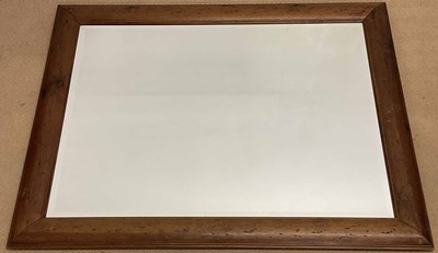 Lot 2829 - A stained pine framed wall mirror; 75 x101 cm