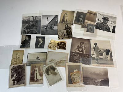 Lot 2065 - A collection of black and white photographs,...