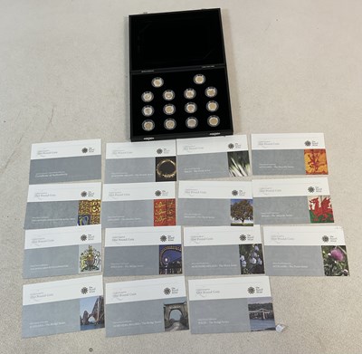 Lot 1174 - ROYAL MINT; a cased set of fourteen £1 silver...