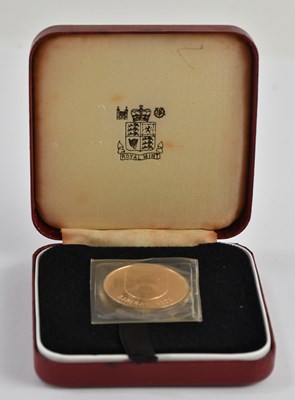 Lot 1353 - THE ROYAL MINT; a 1979 commemorative gold coin...