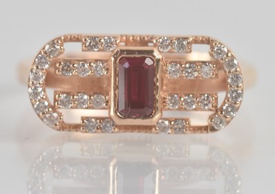 Lot 1189 - A 14ct yellow gold ruby and diamond set ring,...