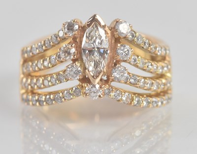 Lot 1179 - An 18ct yellow gold diamond set ring, the...