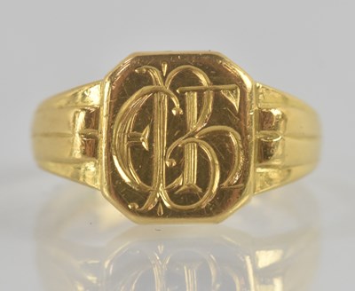 Lot 1203 - An 18ct yellow gold signet ring, with the...