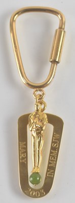 Lot 1169 - An 18ct yellow gold keyring, modelled as an...