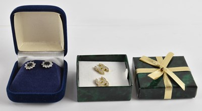 Lot 1291 - A pair of 10K yellow gold Chanel style double '...