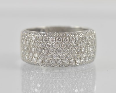 Lot 1180 - An 18ct white gold multi-row pavé diamond set...