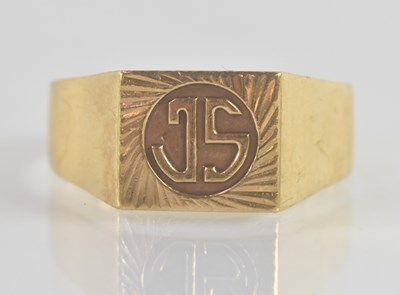 Lot 1210 - A 9ct yellow gold signet ring, the square...