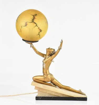 Lot 137 - An Art Deco bronzed spelter figural table lamp...