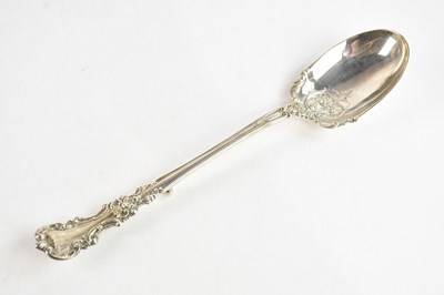 Lot 171 - A sterling silver basting spoon with cast...