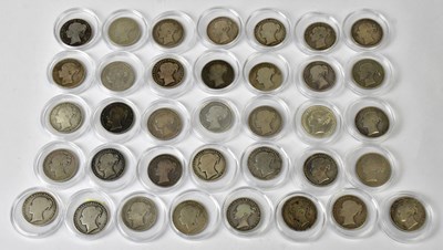Lot 815 - Thirty-six, mostly Victorian, silver shillings.