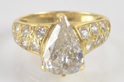Lot 1181 - A yellow metal diamond solitaire ring, with...