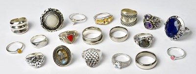 Lot 1040 - Nineteen 925 silver rings, to include an...