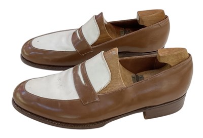 Lot 458 - JOHN LOBB; a pair of white and brown leather...