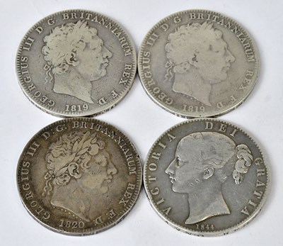 Lot 838 - Four silver crowns, comprising three George...