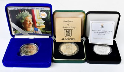 Lot 963 - Three silver-proof coins, comprising a 2002...