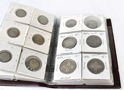 Lot 812 - A coin folder containing a collection of...