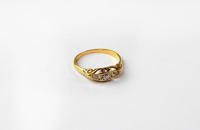 Lot 1006 - An 18ct yellow gold dress ring set with five...