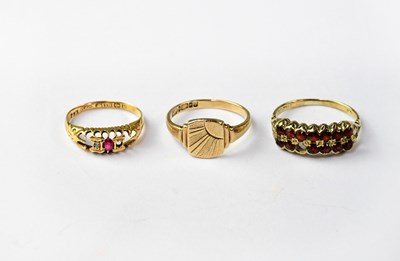 Lot 1094 - A 9ct yellow gold signet ring, a 9ct yellow...