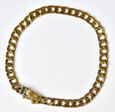Lot 1054 - A 9ct yellow gold flat curb link bracelet,...