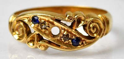 Lot 1037 - A yellow metal ring set with two tiny diamonds...