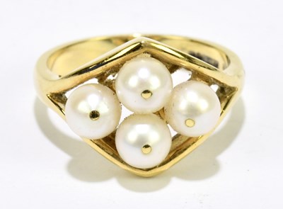 Lot 1147 - An 18ct yellow gold and pearl set ring with...