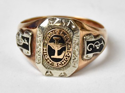Lot 1016 - A 10K white and yellow gold ring, the central...