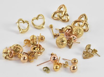 Lot 1175 - A quantity of assorted yellow metal earrings...