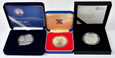 Lot 953 - ROYAL MINT; three silver-proof crowns,...