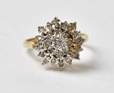 Lot 1021 - A 9ct yellow gold diamond cluster ring, size N,...