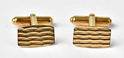 Lot 1117 - A pair of 9ct yellow gold cufflinks with...