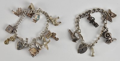 Lot 1484 - A 925 silver charm bracelet including swooping...