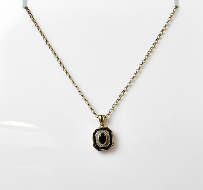 Lot 1090 - A 9ct yellow and white gold Art Deco style...
