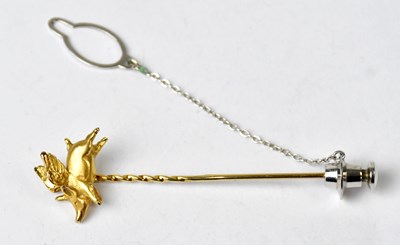 Lot 1120 - A 9ct yellow gold tie pin modelled as a flying...