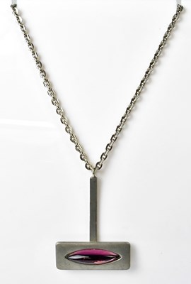 Lot 1105 - JORGEN JENSEN; a pewter pendant set with a...