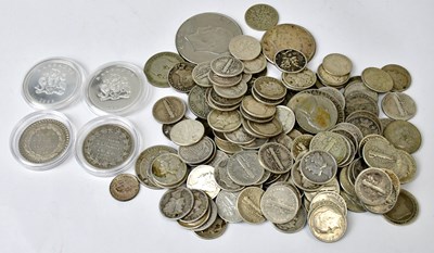 Lot 875 - A collection of World coinage, to include two...