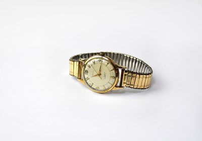 Lot 1265 - BAUME; a yellow metal gentlemen's wristwatch,...