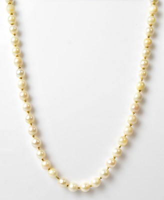 Lot 1108 - A single-strand pearl necklace, with a 9ct...