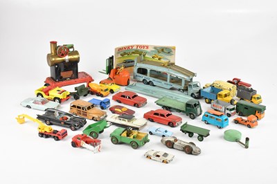 Lot 1531 - DINKY; a collection of playworn diecast model...
