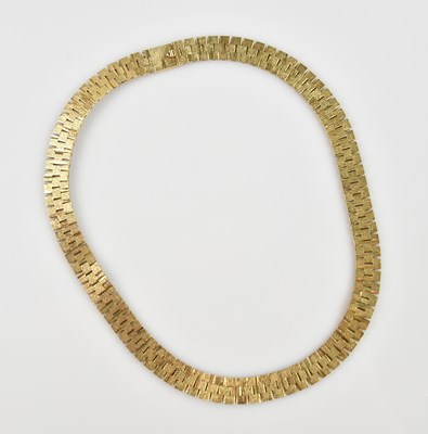 Lot 2036 - A 9ct yellow textured gold collar, length...