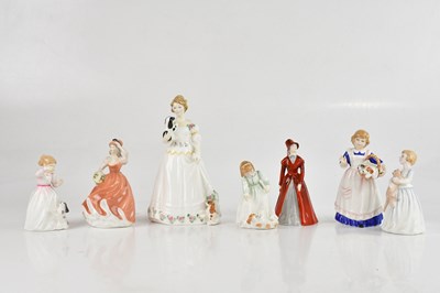 Lot 1779 - ROYAL DOULTON; a collection of five figures...